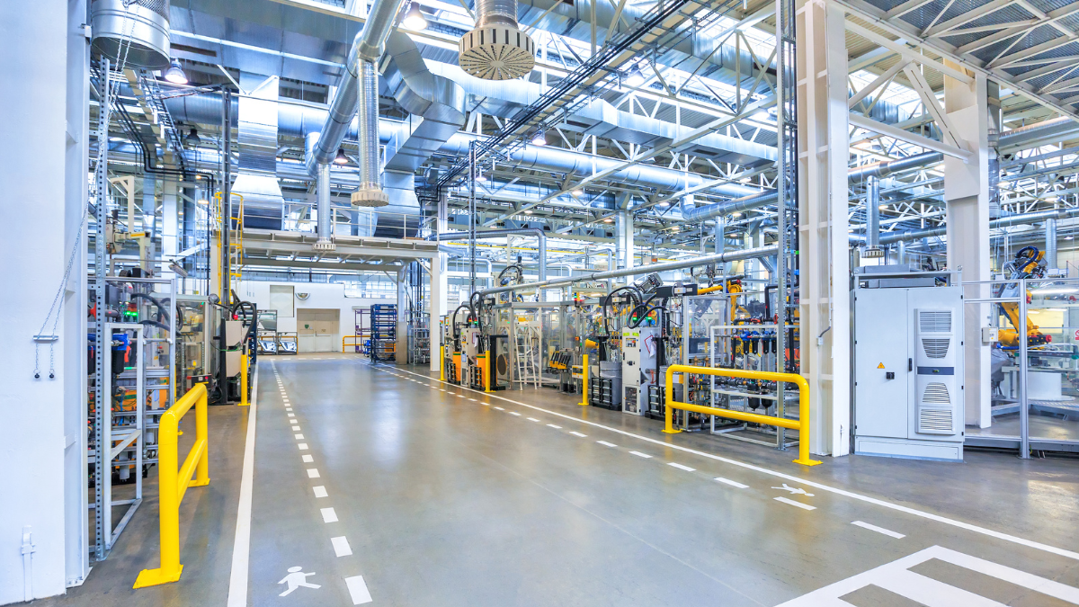 the interior of a factory belonging to an organization currently comparing the differences between GD&T standards